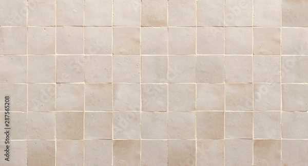 Fototapeta Old retro beige ceramic tile texture background. Beige square tiled wall.