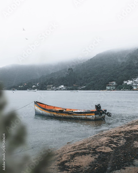 Obraz Vintage and beautiful boat at the sea with texture and nice details - Rainny day 