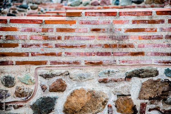 Fototapeta Detail of colorful stone wall in the center of Sofia.