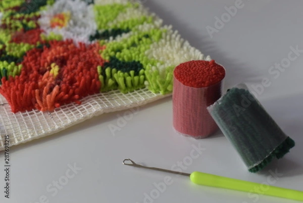 Obraz A rug in latch hoook technique with thread chunks and hook