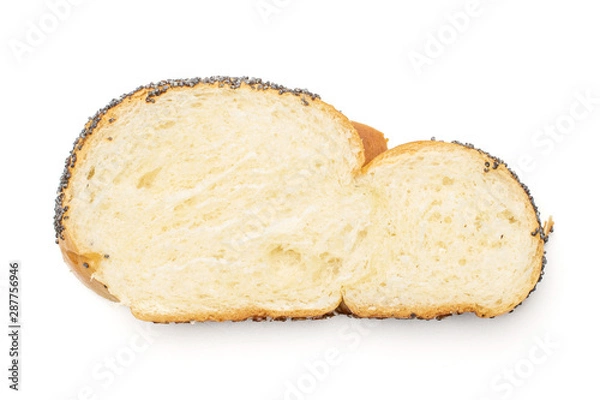 Fototapeta One slice of twisted poppy seed bun flatlay isolated on white background