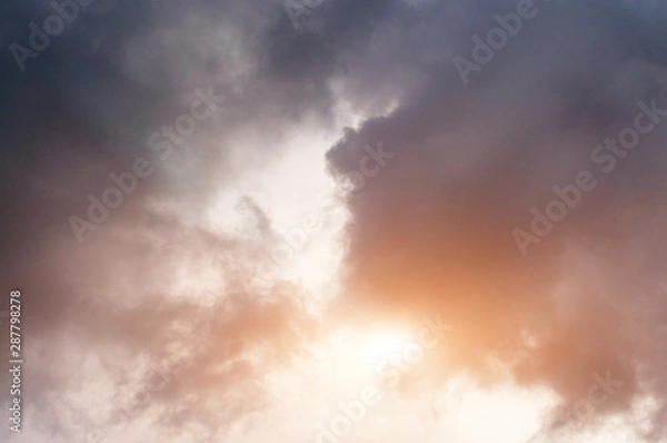 Fototapeta Clouds and sky. The rays of the sun in the gaps between the curly clouds. the sky before the rain. The sky after the rain.