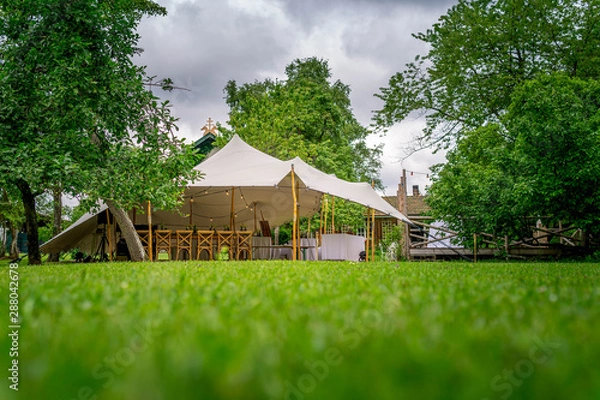 Fototapeta Image of huge tent for a wedding event in the nature
