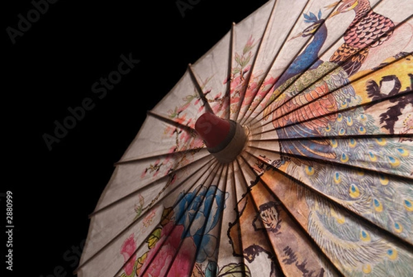 Fototapeta paper parasol on black iso