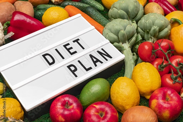 Fototapeta Assorted fruits and vegetables for diet plan