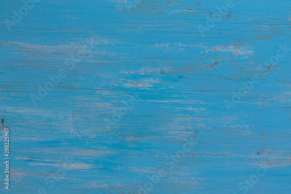 Obraz Background in the form of a wooden surface painted in blue with light spots with a horizontal texture