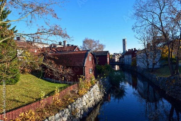 Fototapeta View of Västerås city skyline on an autumn day with the river that runs through the city