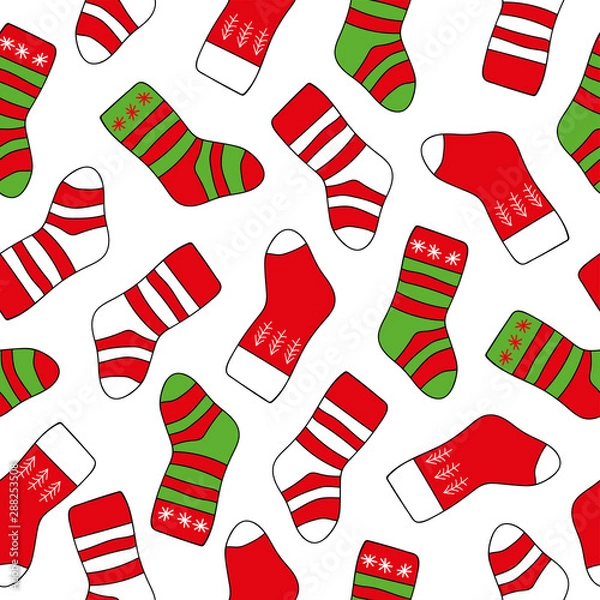 Obraz Seamless background Christmas Socks on the white background. New Year and Christmas background with bright striped socks of red and green color.