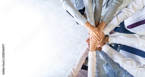 Fototapeta Stack of hands. Unity and teamwork concept.