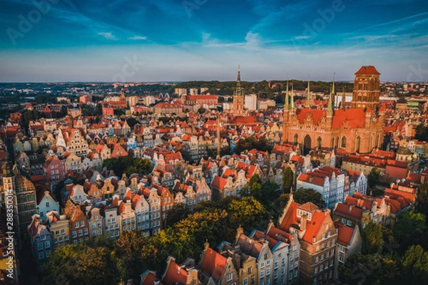 Obraz Gdansk is a city in Poland. Gdansk in the morning rays, the sun is reflected from the roofs of the old city.