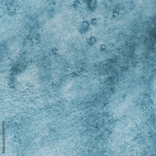Fototapeta Blue watercolor winter texture with abstract washes and brush strokes on the white paper background.