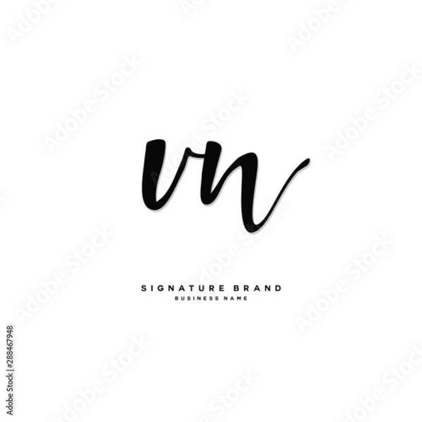 Fototapeta V N VN Initial letter handwriting and  signature logo concept design.