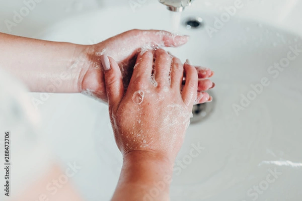 Fototapeta Hygiene. Cleaning Hands. Washing hands with soap