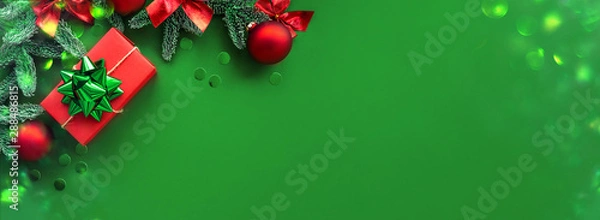 Fototapeta Christmas composition.  Background with gift box and decorations.