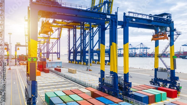 Fototapeta Container crane, Harbor cargo crane for shipping container box port equipment.