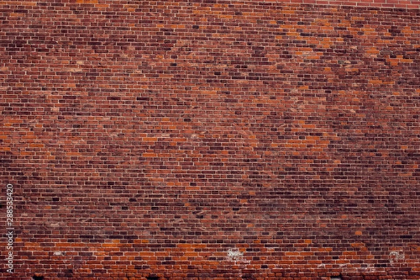 Fototapeta Red bricks wall background. Old building surface