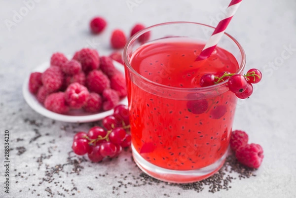 Fototapeta drink with red currant and raspberrry and chia seeds