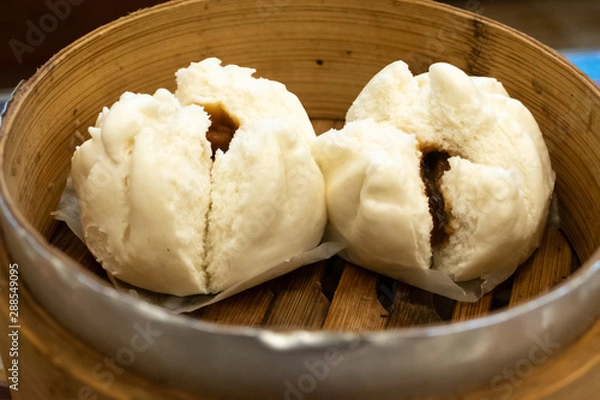 Fototapeta Cantonese dim sum in bamboo steamer