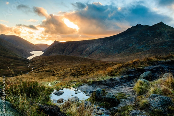 Fototapeta Ben Crom Reservoir in the Mourne Mountains, County Down, Northern Ireland, seen at sunset