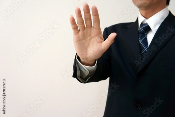 Obraz 制止するビジネスマン