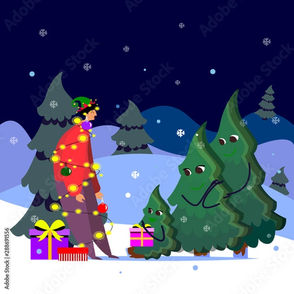 Fototapeta Christmas trees celebrating new year decorated human insead of tree