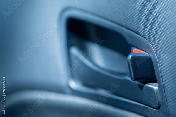 Fototapeta Car door plastic handle locked. Close-up view