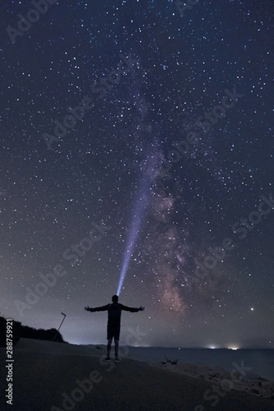 Obraz Mann vor der Milchstraße