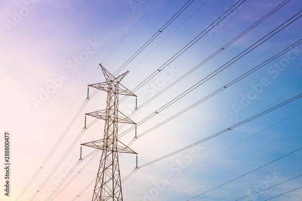 Fototapeta High voltage post tower with blue sky