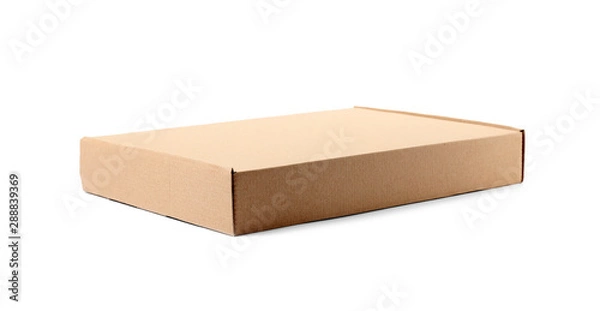 Fototapeta Closed cardboard box on white background. Mockup for design
