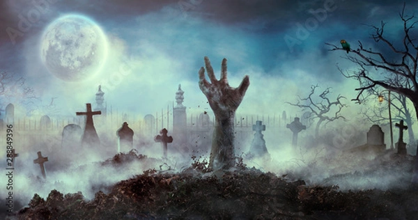 Obraz Ręka zombie podnosi się z grobu