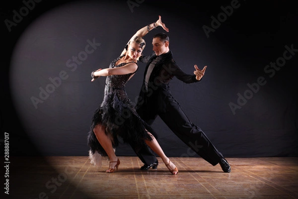 Fototapeta dancers in ballroom isolated on black background