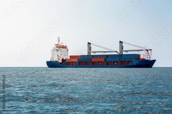 Fototapeta Container ship on ocean