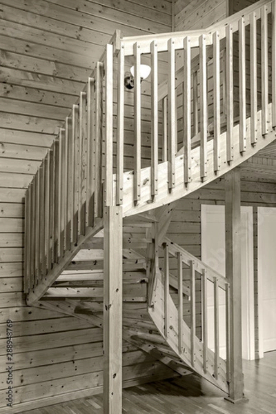 Obraz internal wooden spiral staircase in a yellow monochrome tonality