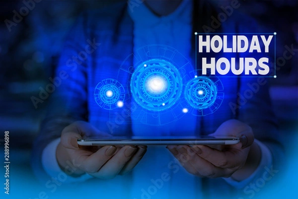 Fototapeta Handwriting text writing Holiday Hours. Conceptual photo Schedule 24 or7 Half Day Today Last Minute Late Closing Woman wear formal work suit presenting presentation using smart device