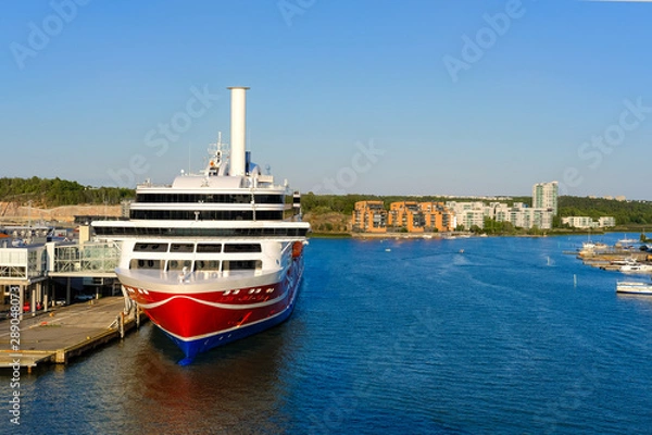 Obraz Sea port on the Aurajoki River, with a passenger ferry standing at the pier. Turku, Finland.