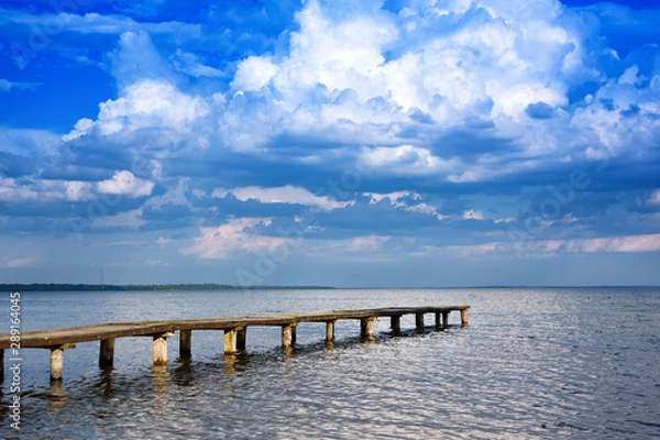 Obraz Panoramic sky over Naroch lake and pier. Belorussia