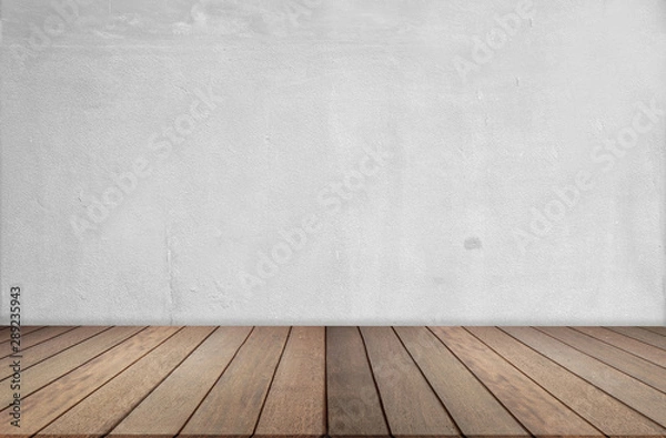 Fototapeta Wood floor and cement wall, empty room for background. Big empty room in grange style with wooden floor