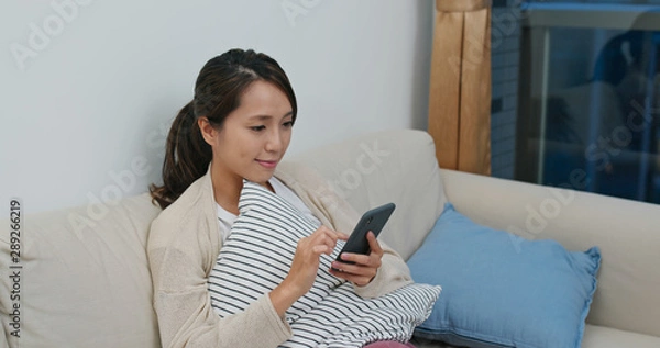 Fototapeta Woman watch tv at home