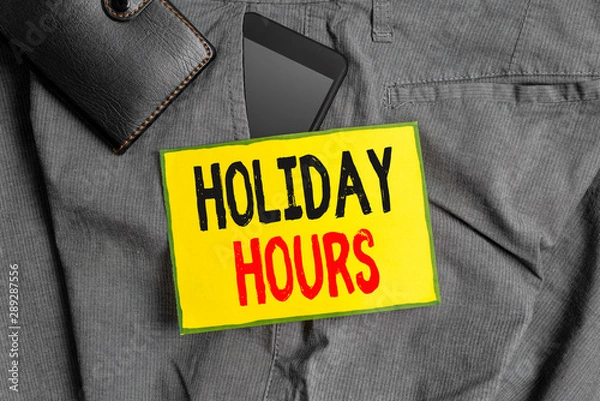 Fototapeta Conceptual hand writing showing Holiday Hours. Concept meaning employee receives twice their normal pay for all hours Smartphone device inside trousers front pocket with wallet