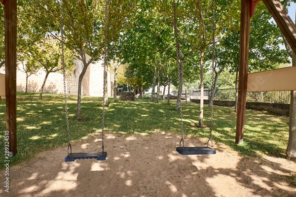 Obraz view of a double empty swing