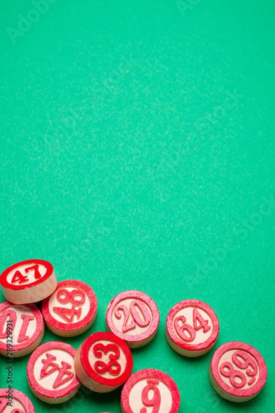 Obraz bingo numbers on green background - flat lay style