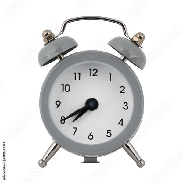 Fototapeta A gray clock with an alarm clock on a white background with arrows showing the time seven hours forty minutes or nineteen hours forty minutes