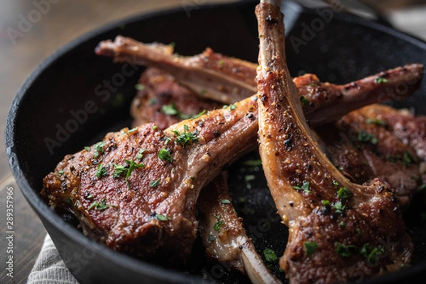 Obraz grilled lamb chop on cast iron pan