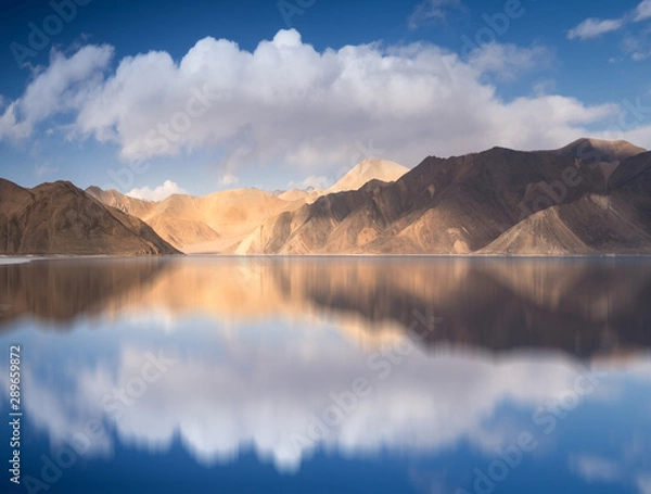 Fototapeta Pangkong Tso in Himalayas range Ladakh, India and Tibet with water reflection. The highest salt water lake in the world.