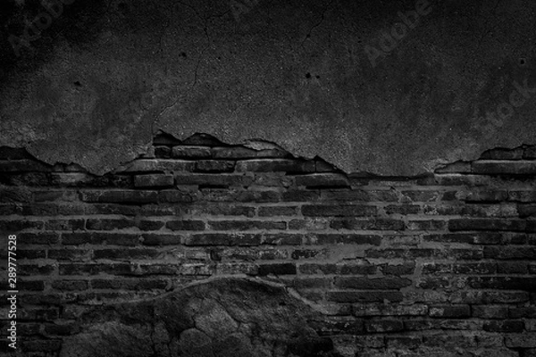 Fototapeta Black brick wall and concrete texture for background.