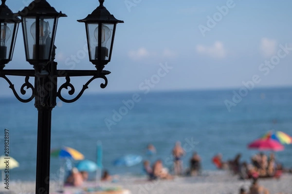 Fototapeta the lantern and the beach