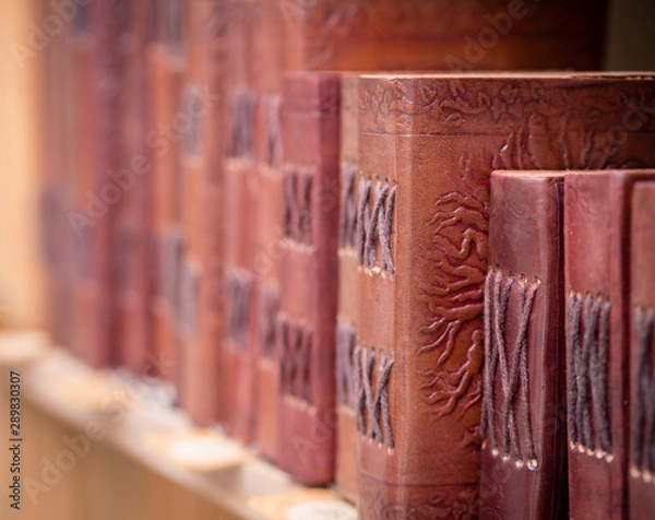 Fototapeta old books in library