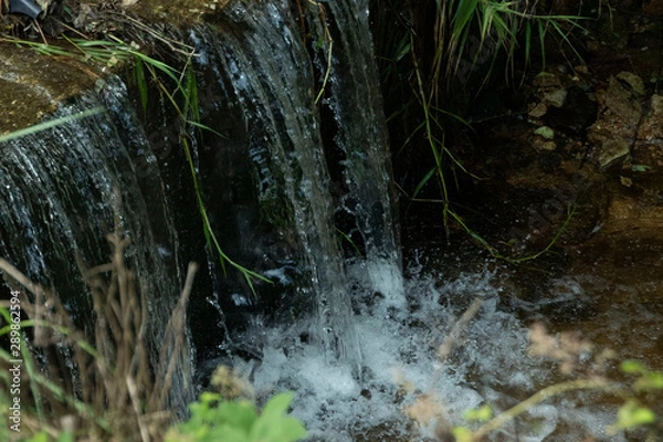 Fototapeta a small waterfall