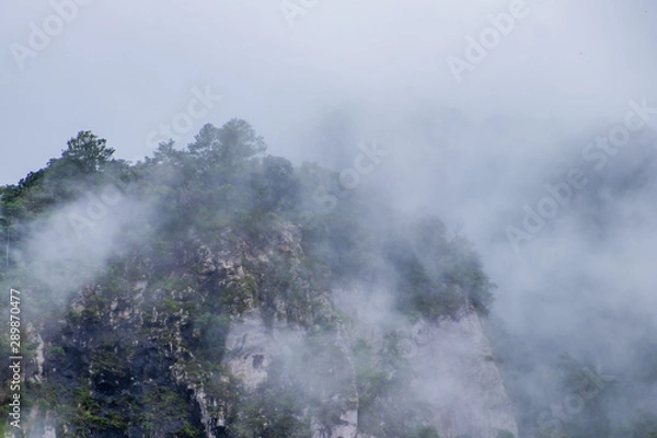 Obraz Viewpoint and green fields in the rainy season cover by fog at Doi Luang Tak, Tak Province,Thailand.
