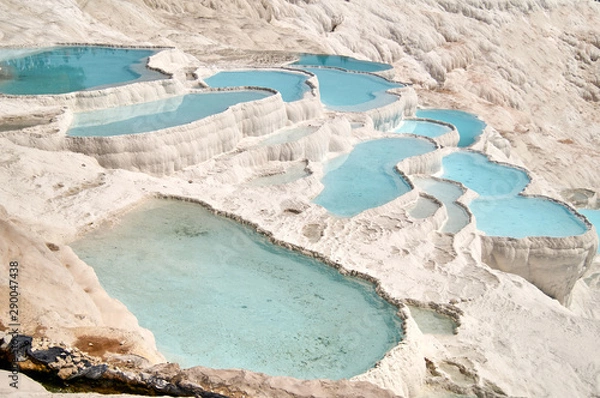 Fototapeta Natural view on travertine pools and terraces in Pamukkale. Cotton castle in southwestern Turkey